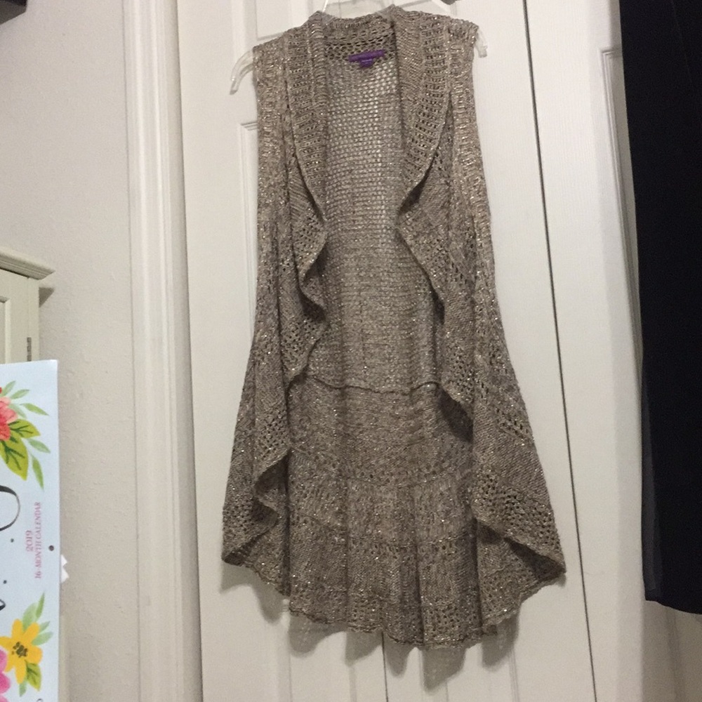 A dressy sleeveless jacket to go over a blouse